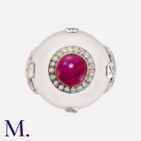 A Ruby, Diamond & Rock Crystal Ring in white gold, in target design, the central cabochon ruby