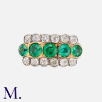 An Old Cut Diamond & Emerald Ring in yellow gold and silver, set with a row of five round cut