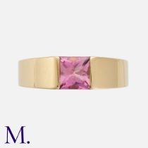 CARTIER. A Pink Tourmaline Tank Ring in 18K yellow gold. Set with a faceted pink tourmaline