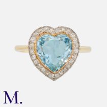 An Edwardian Aquamarine & Diamond Ring in 18k yellow gold, set with a principal heart shaped