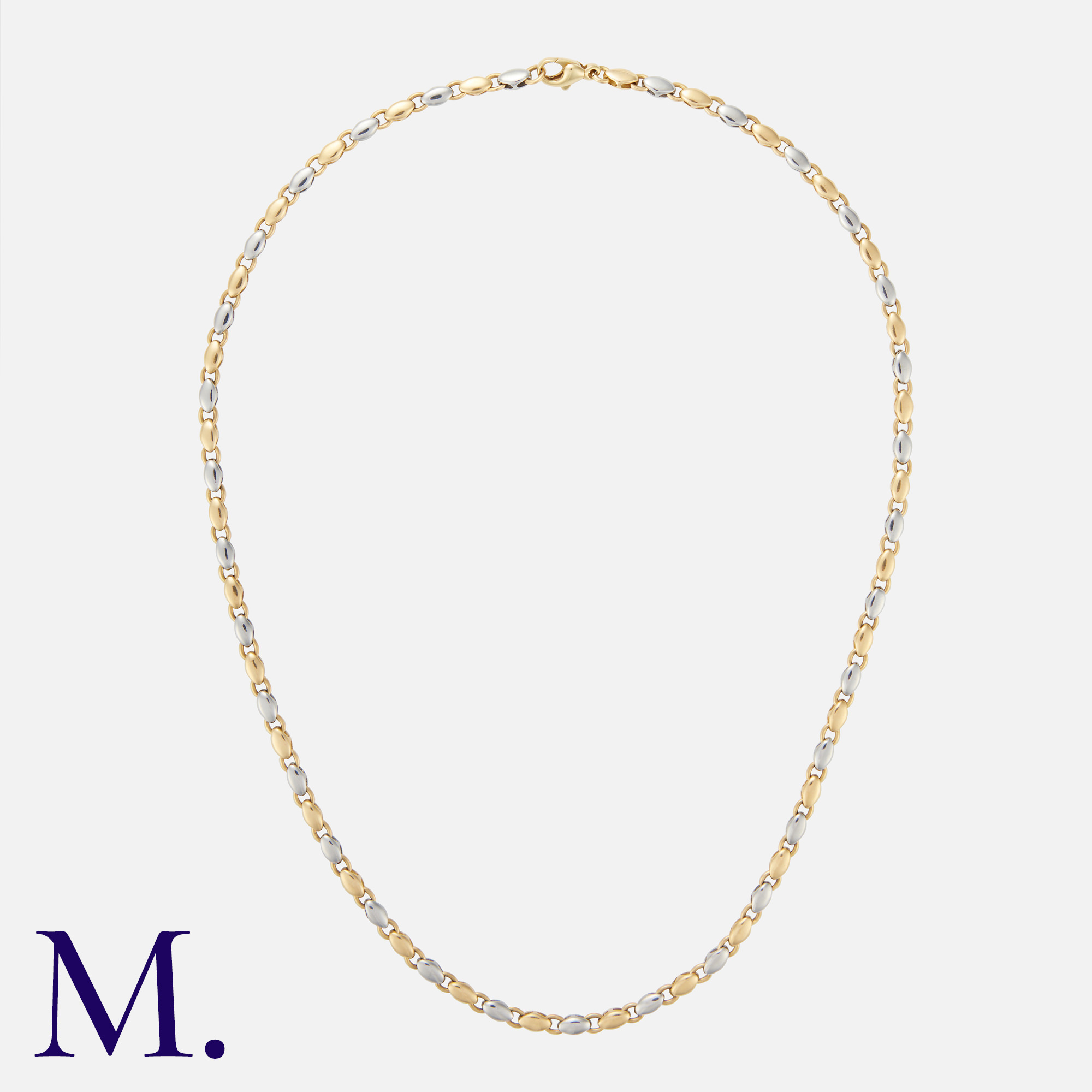 BULGARI. A Gold and Steel Chain in 18K yellow gold and steel, with interlocking oval links. Size: