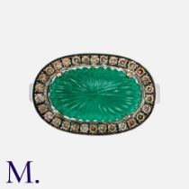 A Carved Emerald & Diamond Cluster Ring in 18k white gold, set with a principal carved cabochon