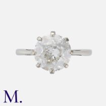 An Old Cut Diamond Solitaire Ring in platinum, set with a principal old cut diamond of approximately