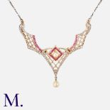 An Edwardian, Ruby, Diamond & Pearl Pendant Necklace in yellow gold and platinum, the openwork