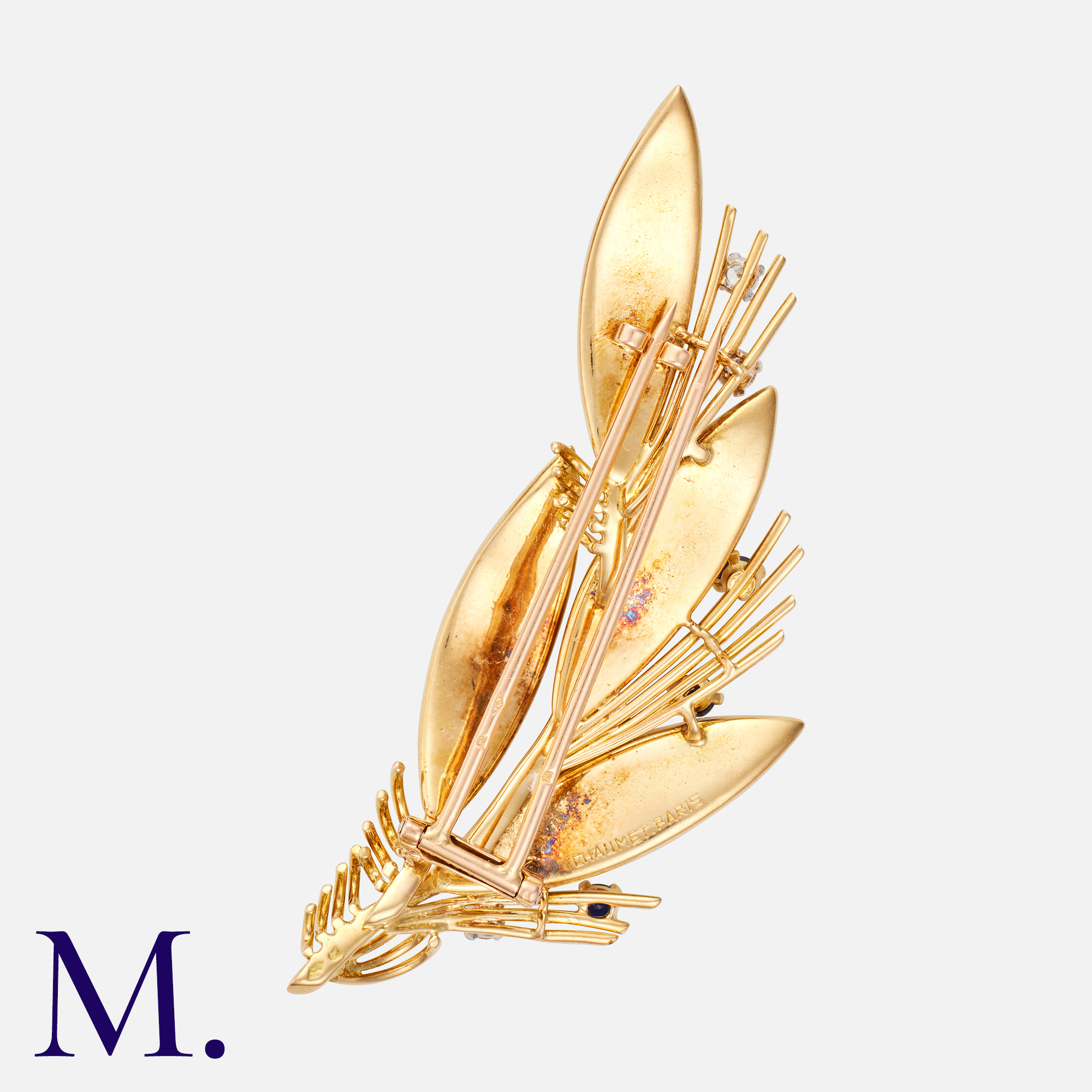 CHAUMET. A Sapphire And Diamond Clip in 18K yellow gold. The foliate form set with round cut - Image 2 of 2