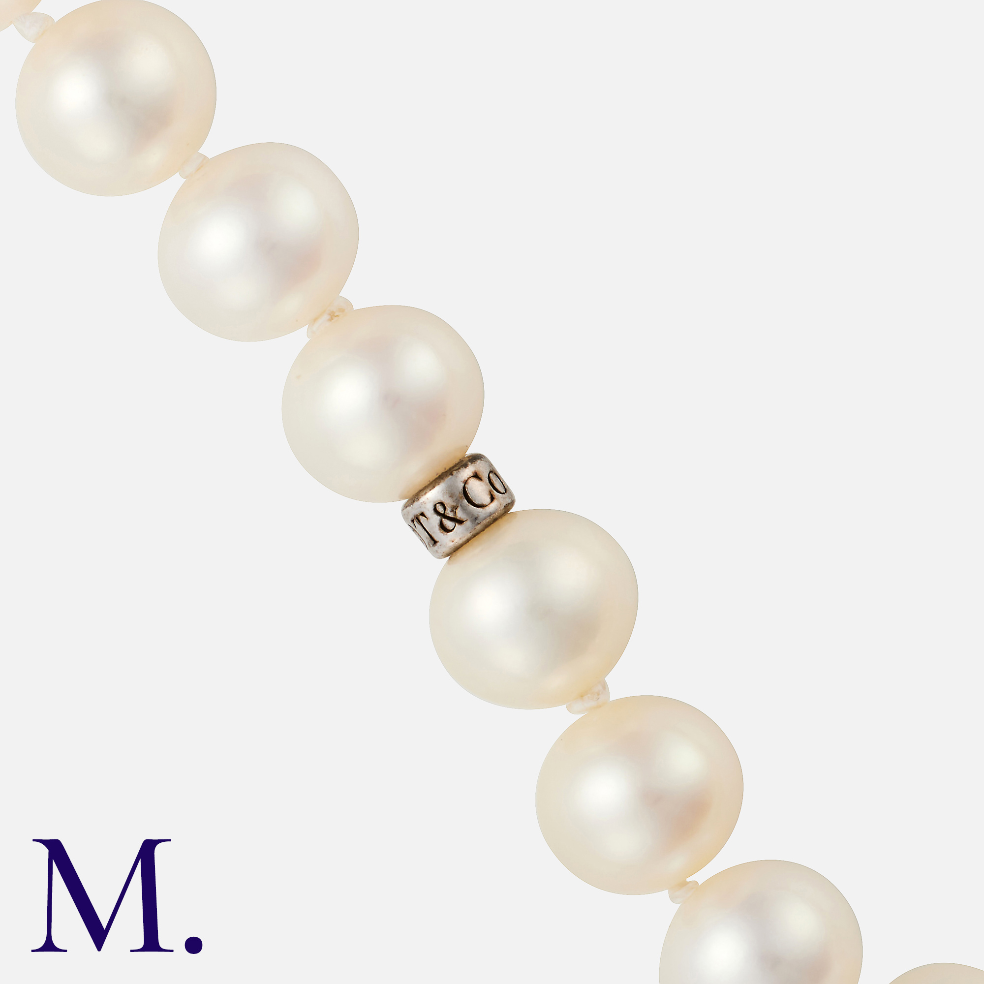 TIFFANY & CO. A Long Pearl Necklace with a silver tag engraved T&Co., set with 8mm pearls. Size: - Image 2 of 2