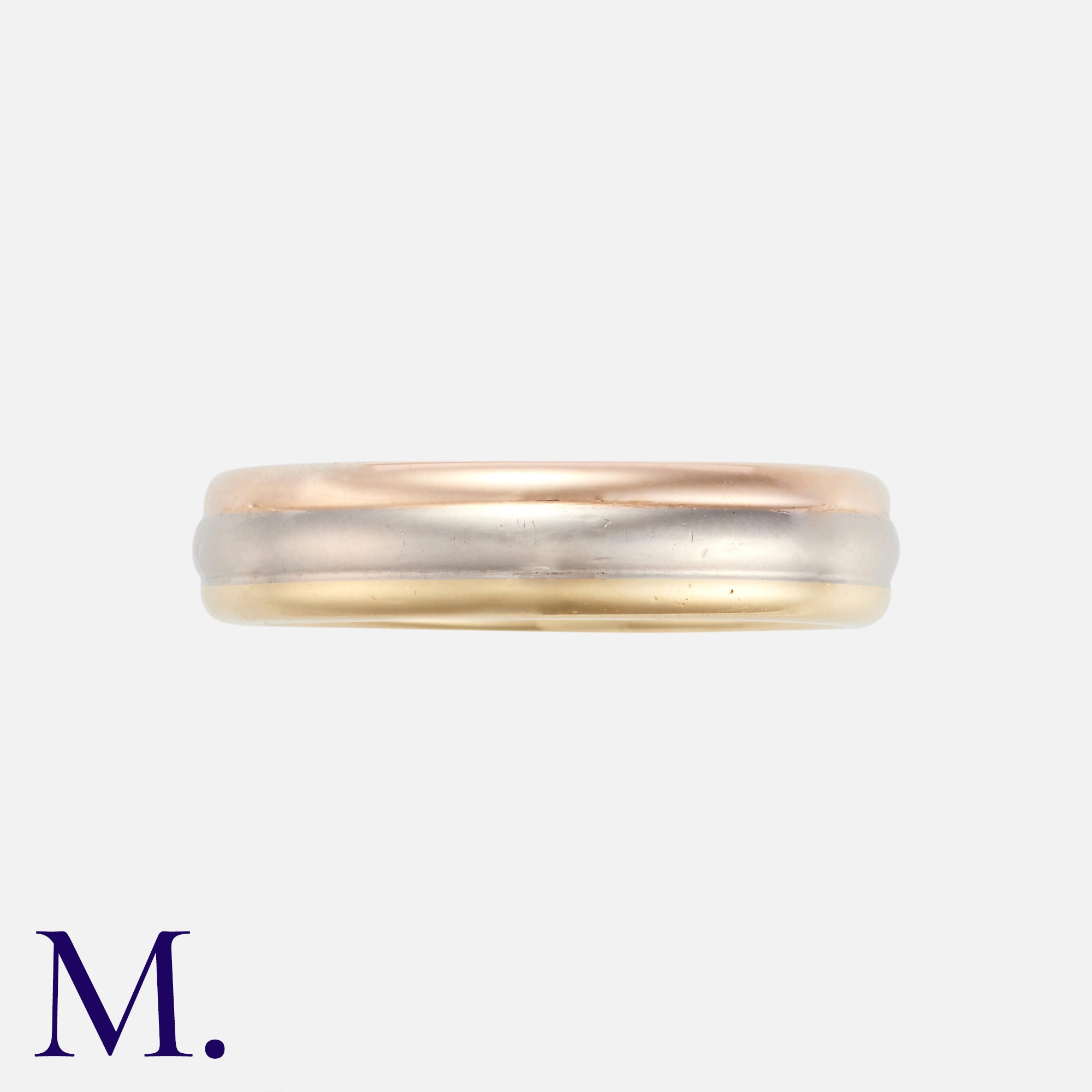 CARTIER. A Vendome Ring in 18K rose, white and yellow gold. Signed Cartier and marked for 18ct gold.