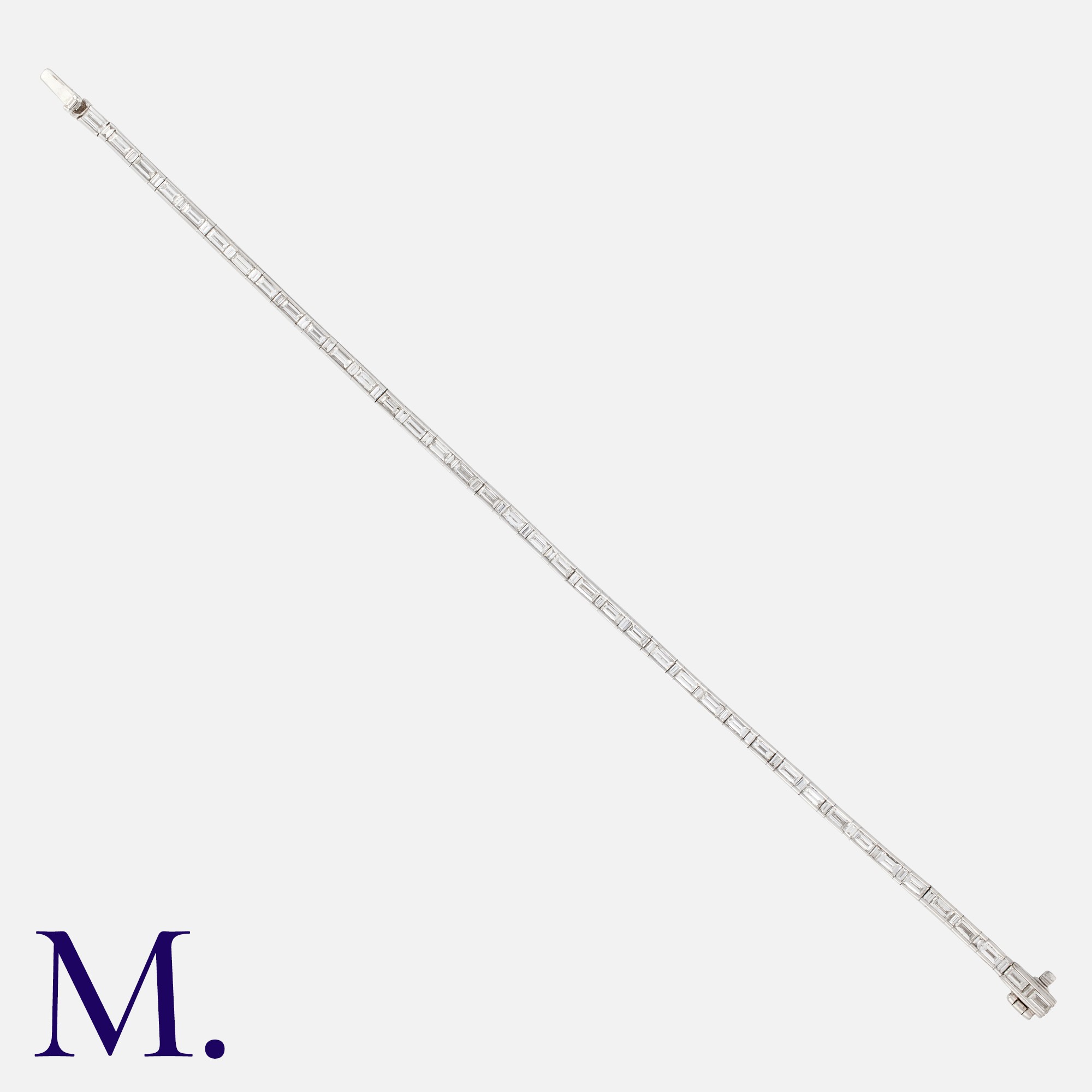 A Diamond Bracelet in 18K white gold, set with baguette diamonds weighing approximately 4.45ct in