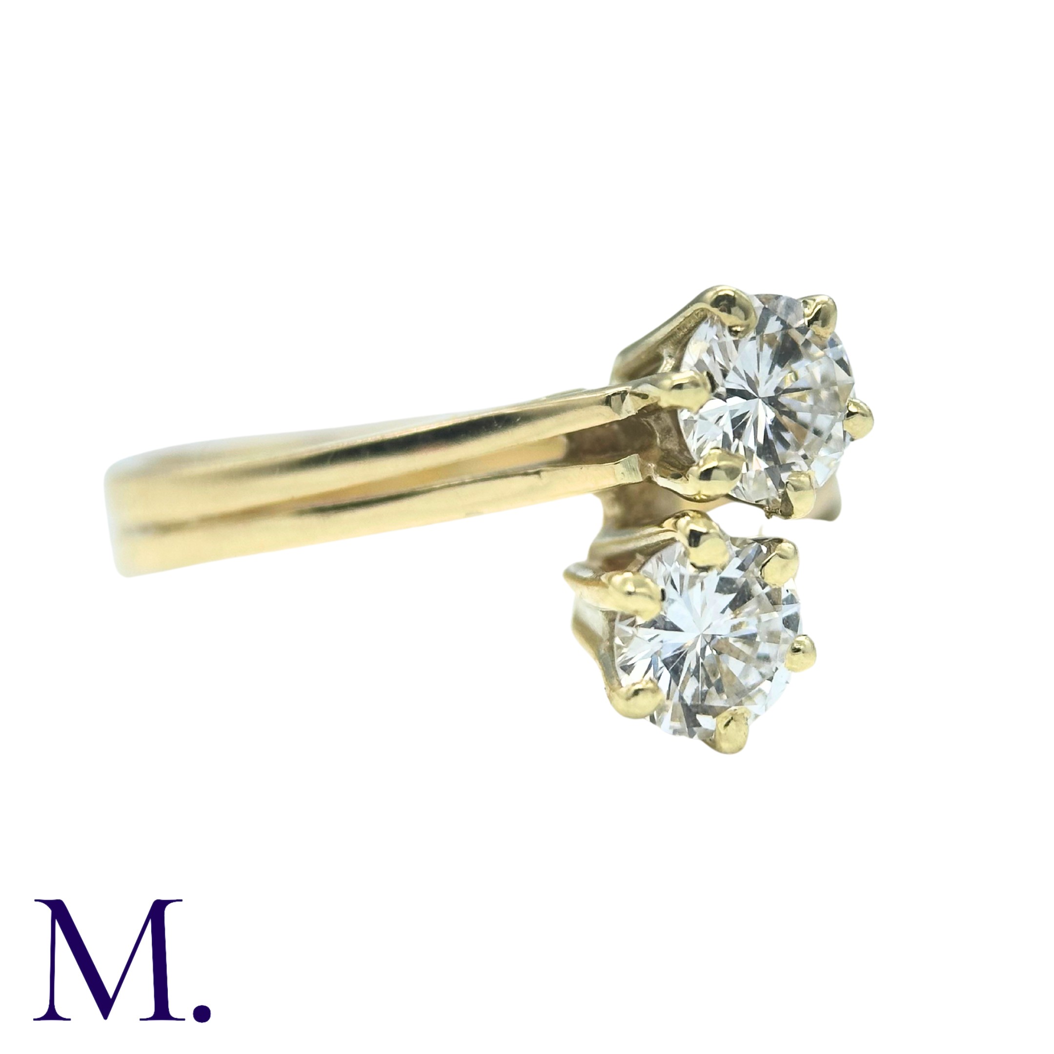 A Diamond 2-Stone Crossover Ring in 18K yellow gold, set with two round cut diamonds weighing - Image 3 of 4