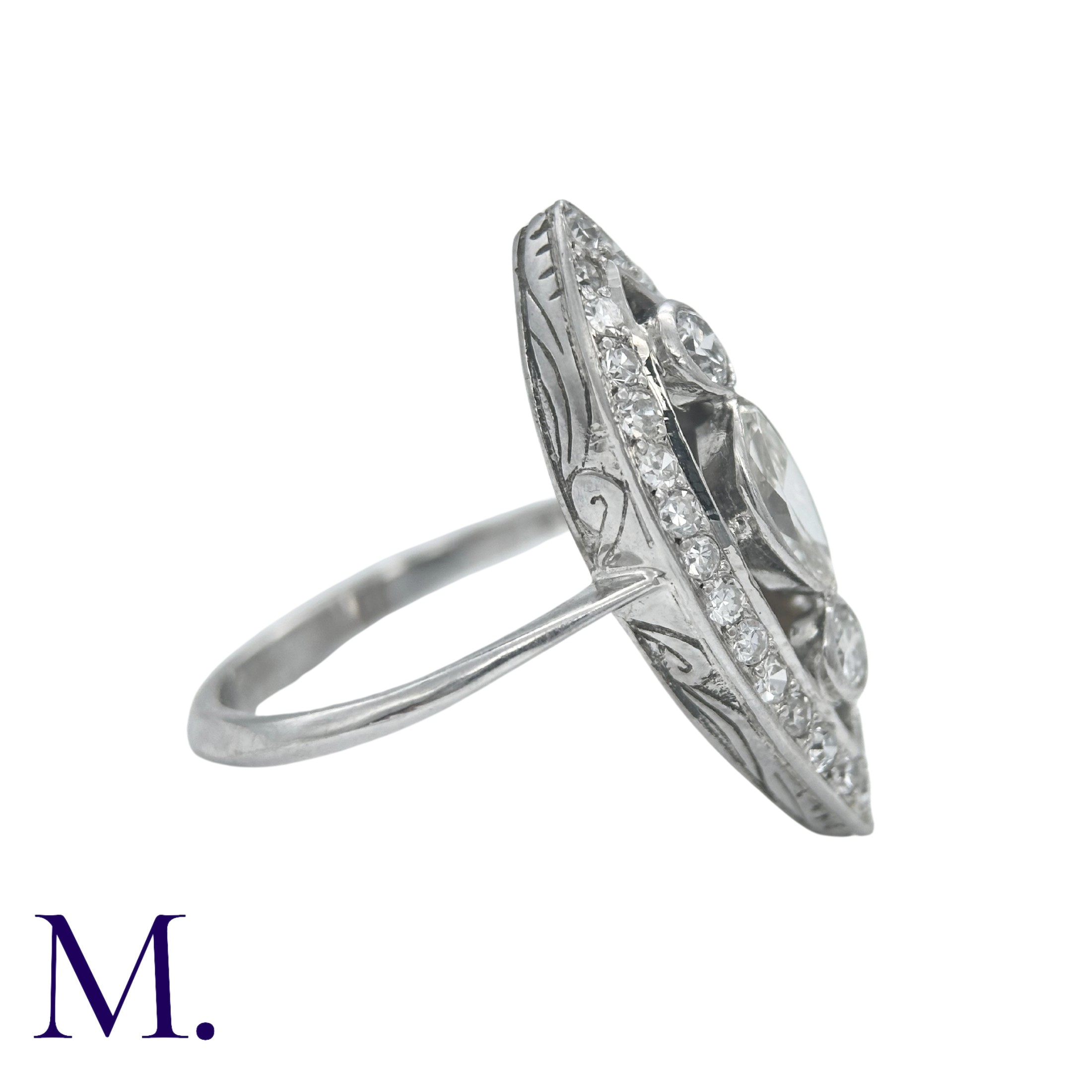An Art Deco Diamond Ring in an openwork marquise shape with two principal round cut diamonds of - Image 2 of 6