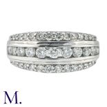 A Diamond Band in 18K white gold, with three rows of diamonds weighing approximately 0.95ct in