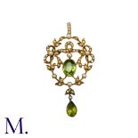 A Peridot And Pearl Pendant in yellow gold, the open work foliate and scrolling form set with an