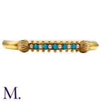 A Pearl And Turquoise Bangle in 15k yellow gold, set with a row of alternating cabochon turquoise