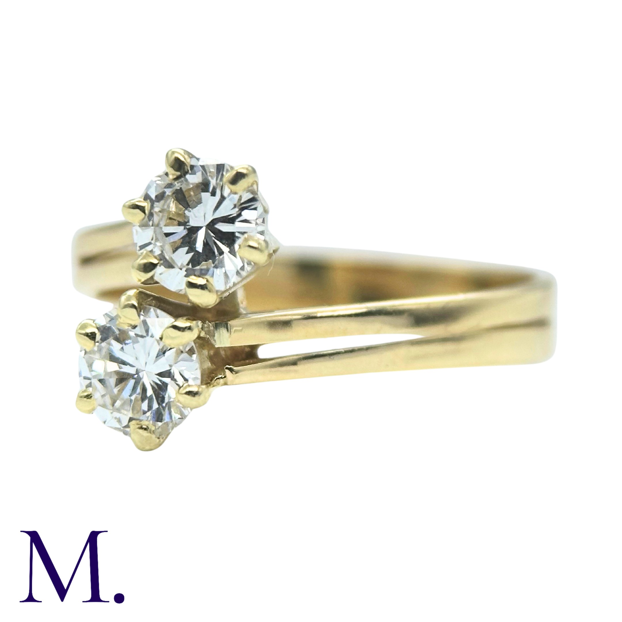 A Diamond 2-Stone Crossover Ring in 18K yellow gold, set with two round cut diamonds weighing - Image 2 of 4