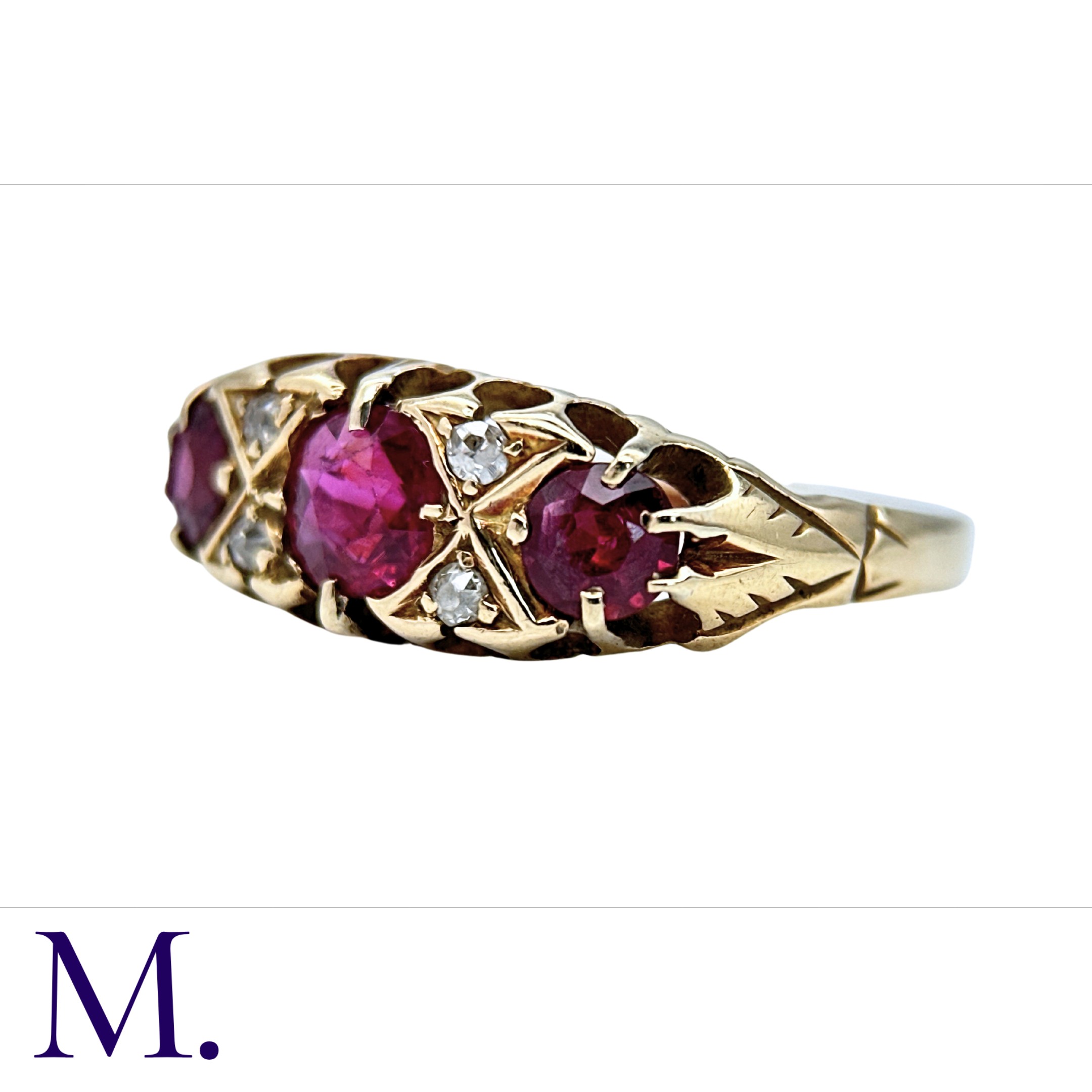 A Red Spinel and Diamond Ring in 18K yellow gold set with three large red spinels and four small - Image 3 of 4