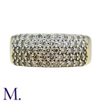 A Brown And White Diamond Ring in 9k yellow gold, set with five rows of pave set diamonds,