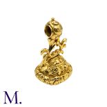 A Large Fob Seal in yellow gold, the ornate foliate top set to the base with a faceted citrine.