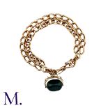 An Antique Fob Bracelet in 9k yellow gold, comprising a double row of interlocking links,