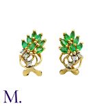 A Pair Of Emerald And Diamond Earclips in 14k yellow gold, set with marquise cut emeralds and