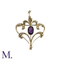 An Amethyst And Pearl Brooch Pendant in yellow gold, the open work foliate and scrolling for set