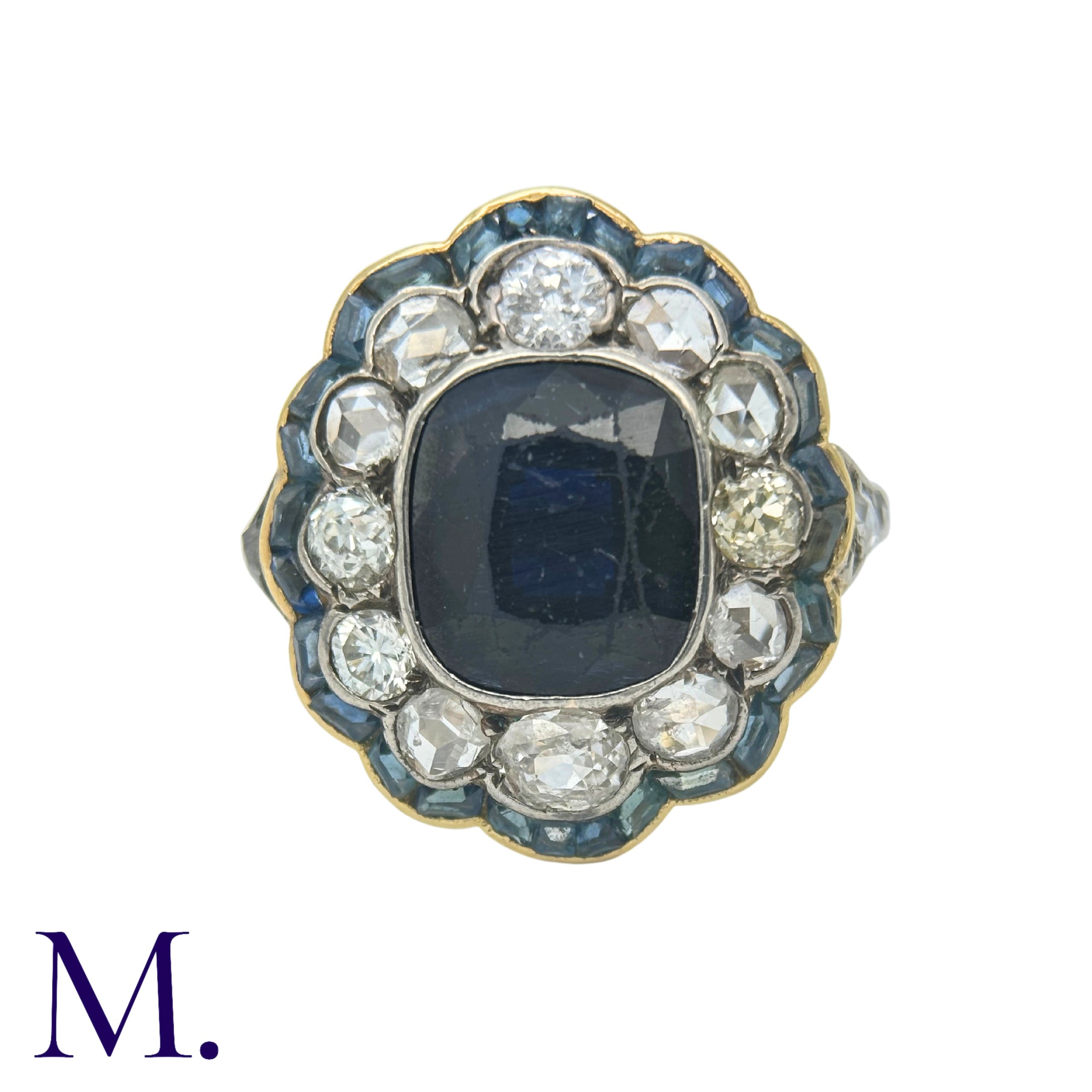 A Sapphire and Diamond Cluster Ring in 18K yellow gold with a large oval-cut sapphire of - Image 2 of 6