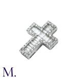 A Diamond Cross Pendant in 18k white gold, set with a princess cut diamonds to the centre accented