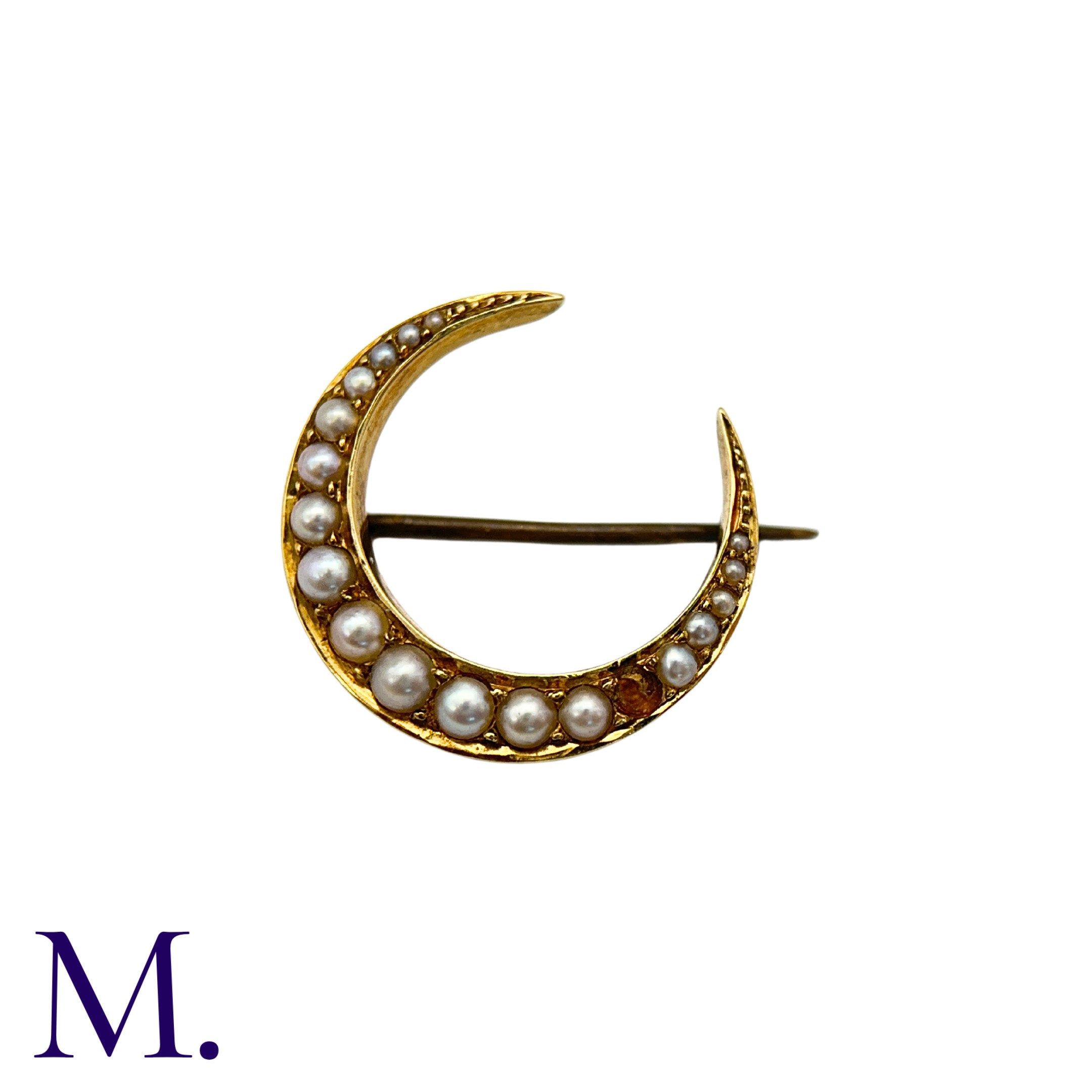A Pearl Crescent Brooch in yellow gold, of crescent form set with a row of graduated pearls.