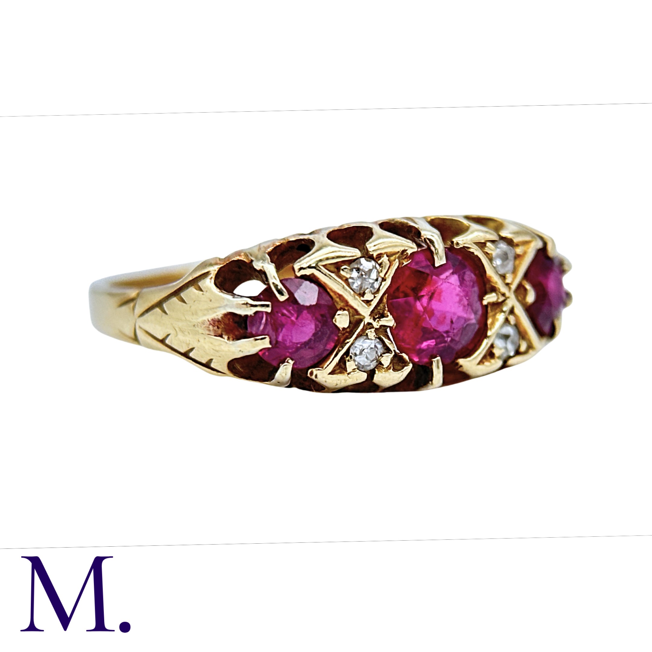 A Red Spinel and Diamond Ring in 18K yellow gold set with three large red spinels and four small - Image 2 of 4