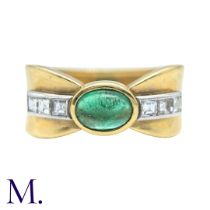 An Emerald And Diamond Ring in 18k yellow gold, set with a cabochon emerald with asscher cut diamond