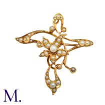 A Pearl Brooch Pendant in 15k yellow gold, the scrolling foliate form set with pearls. Stamped 15ct.