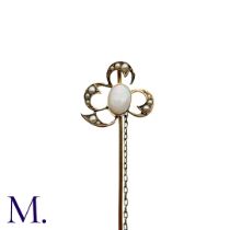 An Antique Opal And Pearl Stick Pin in yellow gold, the terminal designed as a clover, set with a