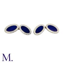 A Pair Of Enamelled cufflinks in 9k yellow gold, decorated with white and blue enamel. Hallmarked