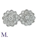 A Pair of Diamond Cluster Earrings in 18K white gold, set with round cut diamonds weighing