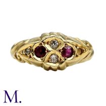 A Ruby And Diamond Ring in 18k yellow gold, set with round cut rubies and round cut and rose cut