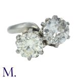 A Diamond Toi et Moi Ring in 18K white gold set with two round cut diamonds weighing approximately