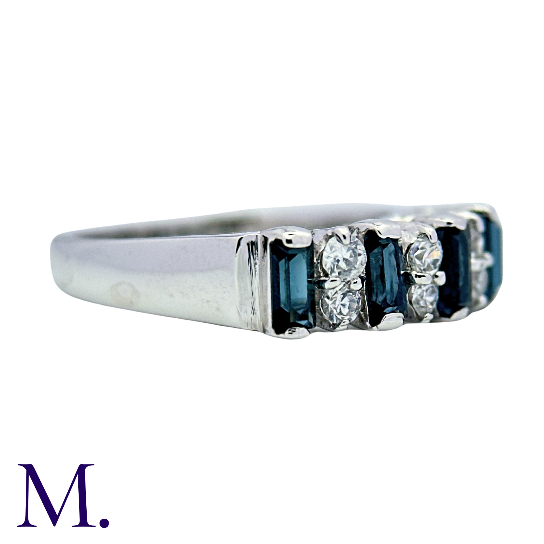 A Sapphire And White Stone Ring in white gold, set with step cut sapphires and round cut white - Image 3 of 4
