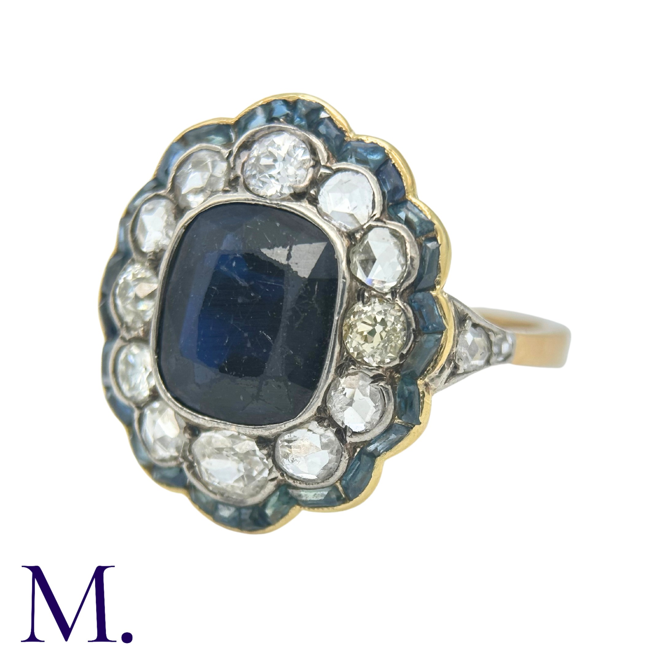 A Sapphire and Diamond Cluster Ring in 18K yellow gold with a large oval-cut sapphire of - Image 3 of 6