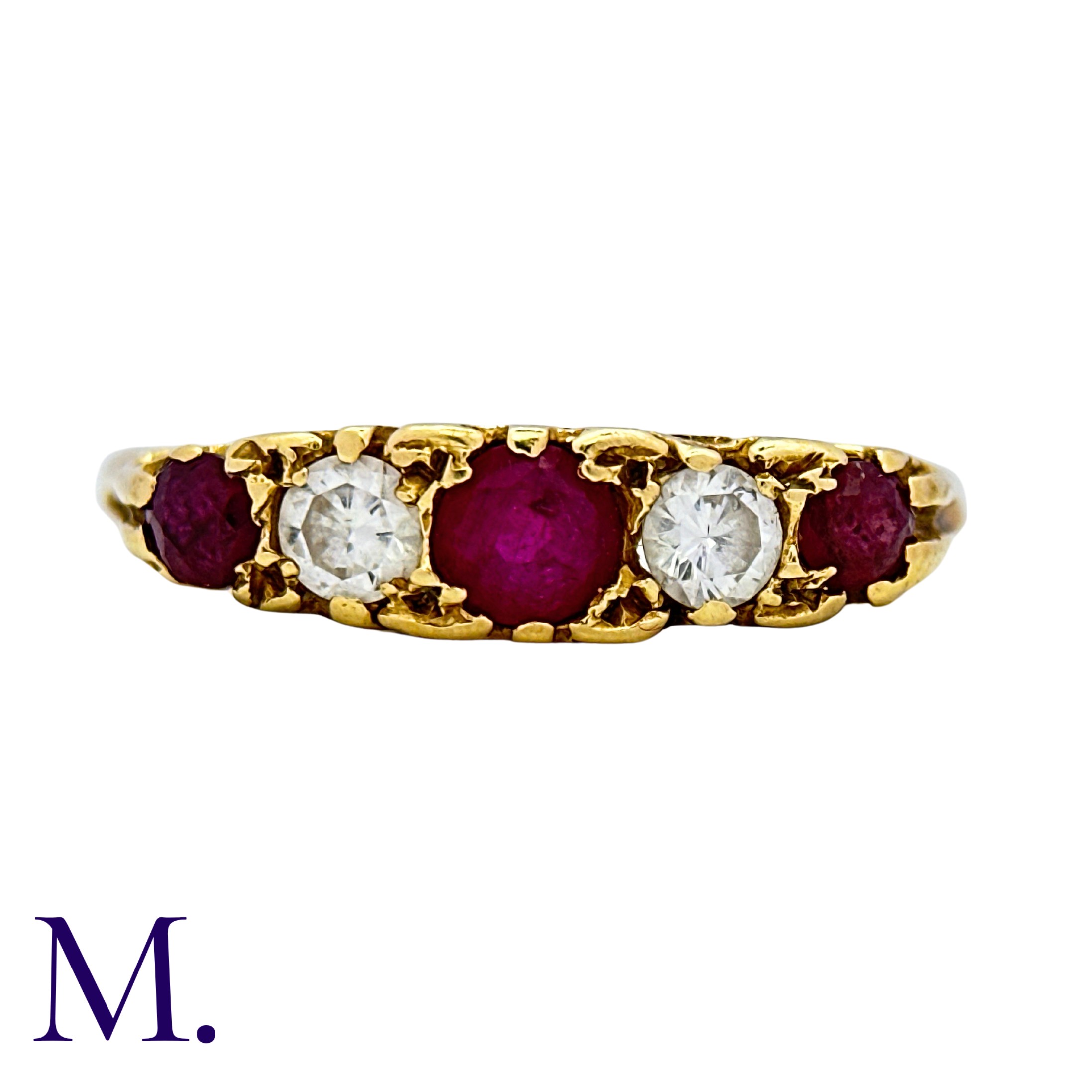 A Ruby And Diamond Five Stone Ring in 18k yellow gold, set with three round cut rubies punctuated by