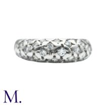 A Diamond Bombé Ring in 18k white gold, set with round cut diamonds totalling approximately 1.00cts.