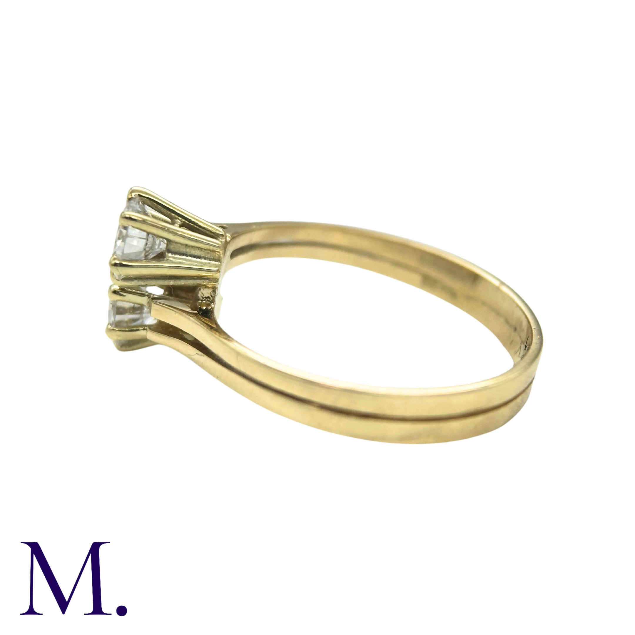 A Diamond 2-Stone Crossover Ring in 18K yellow gold, set with two round cut diamonds weighing - Image 4 of 4