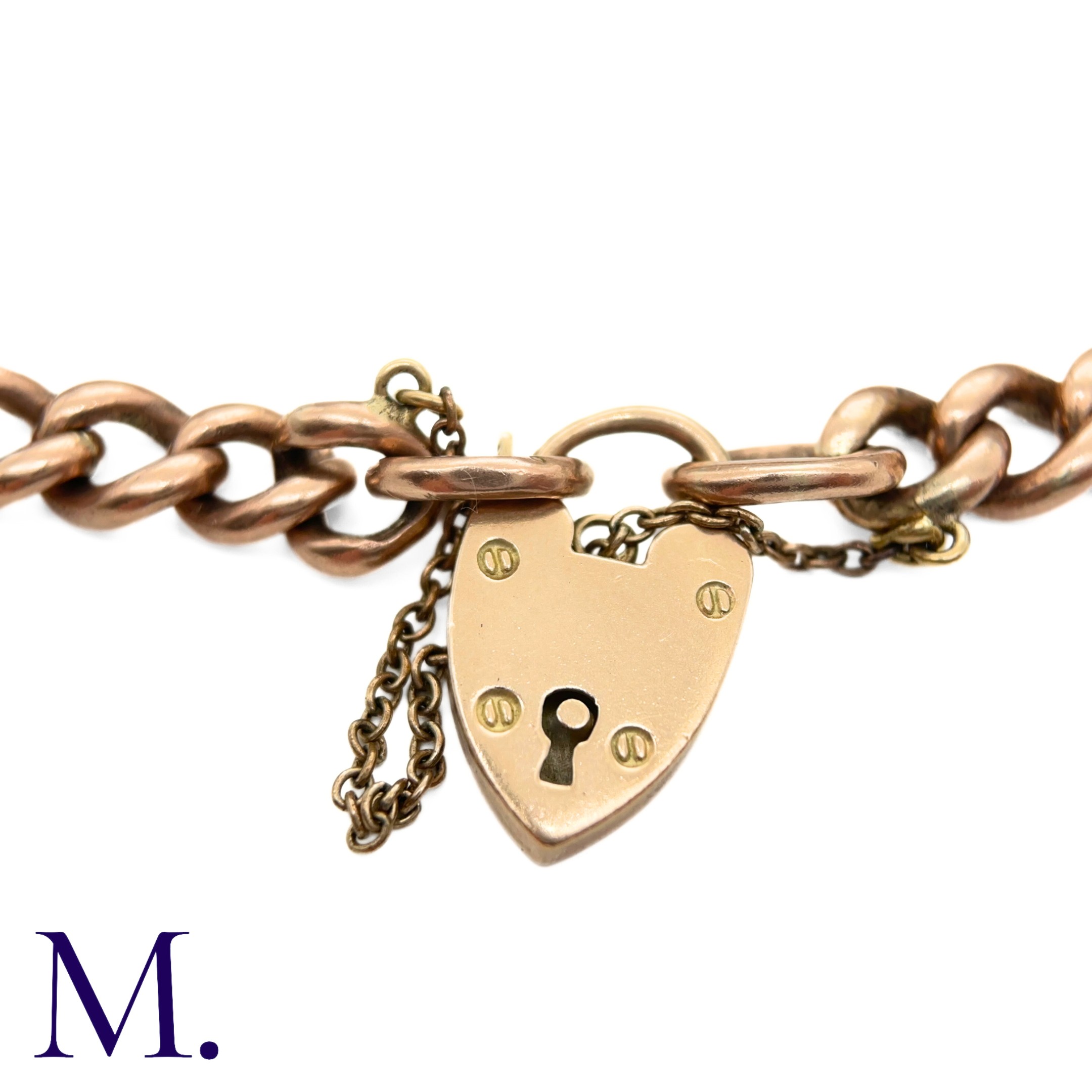 A Large Antique Curb Bracelet in 9K rose gold. Secured with heart-shaped padlock. Marked '375' for - Image 2 of 4