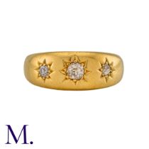 A Diamond Gypsy Ring in 18K yellow gold set three old cut diamonds. Hallmarked for 18ct gold.