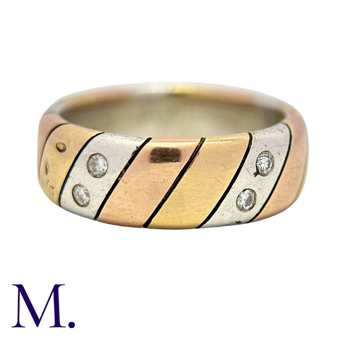VAN CLEEF & ARPELS. A Diamond Ring in 18K yellow, white and rose gold, set with ten round