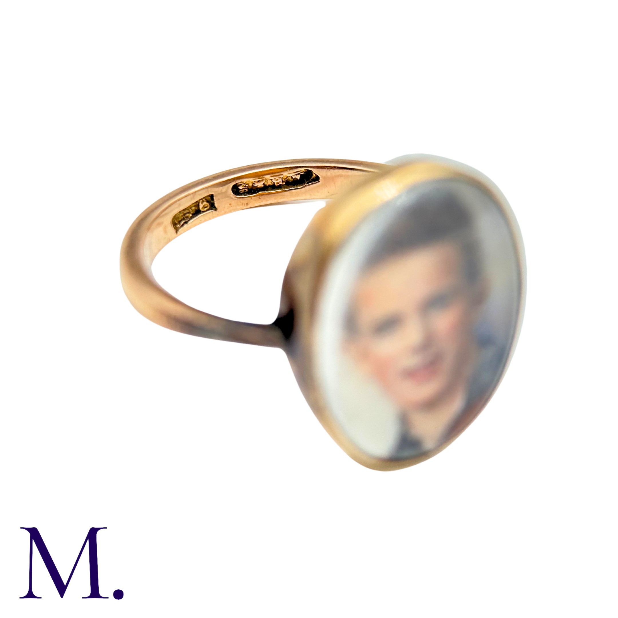 A Portrait Ring in 9k yellow gold, set with a portrait of a young man behind a glass face. Marked - Image 3 of 4