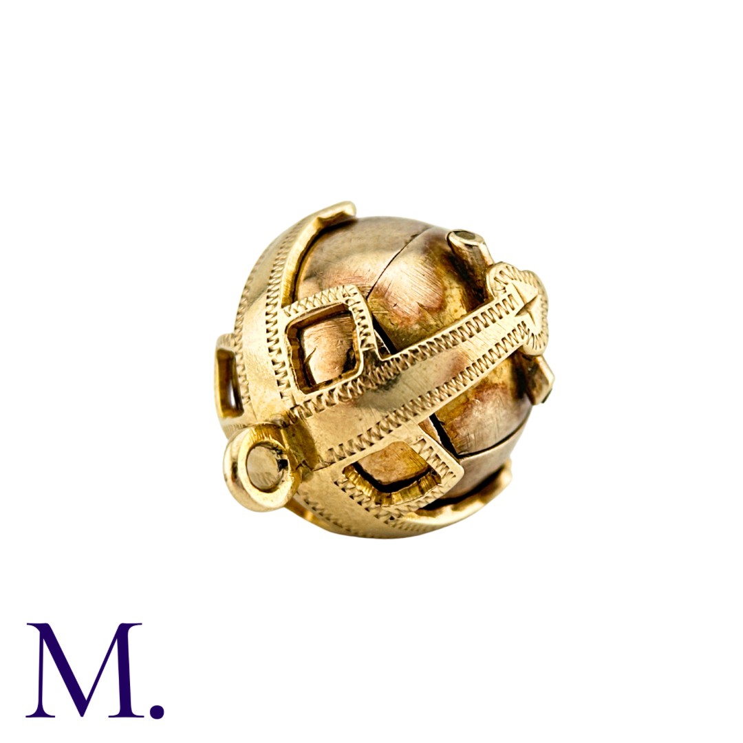 A Masonic Orb Pendant in 9k yellow gold and silver, the hinged spherical body opens to display a - Bild 2 aus 3