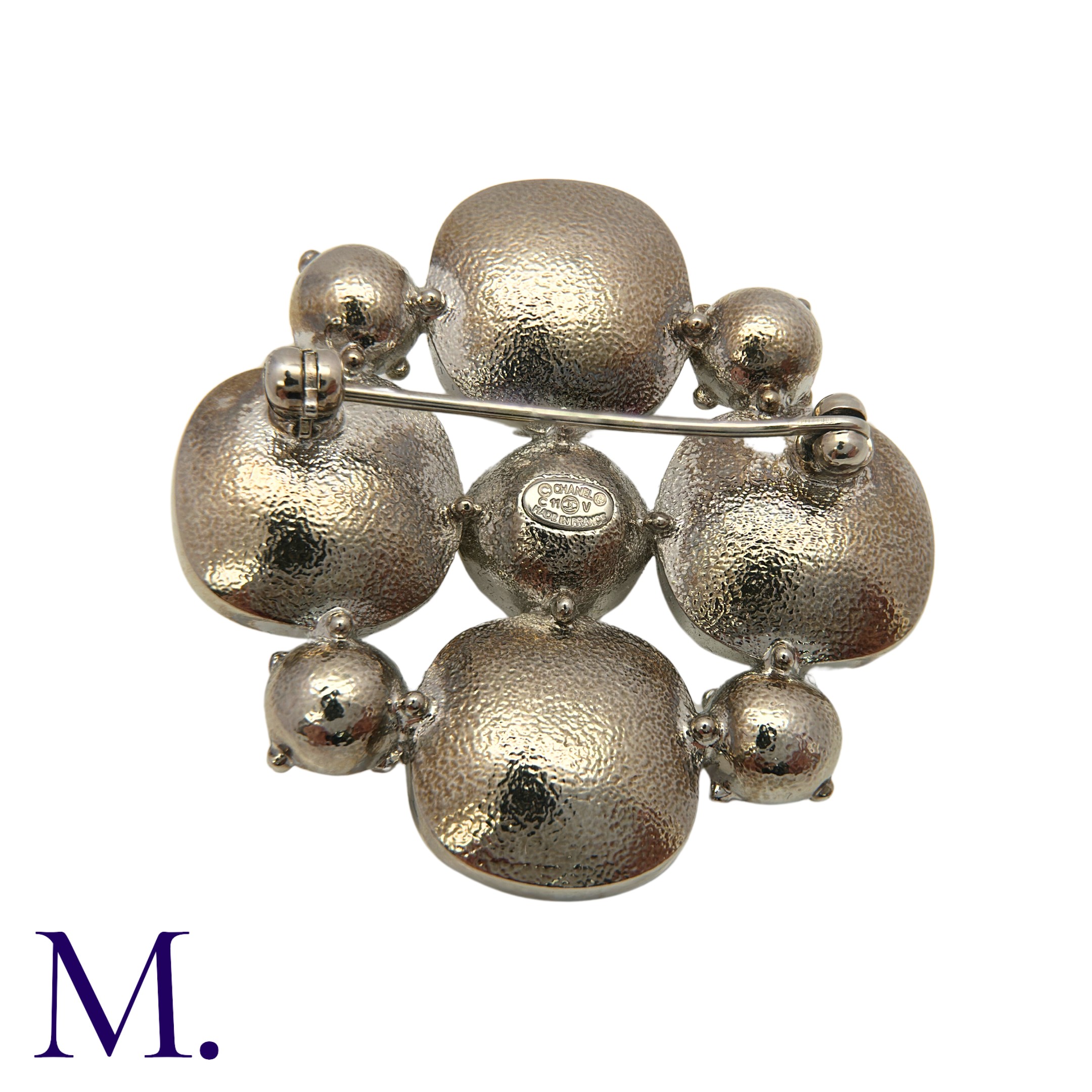 CHANEL. A Costume Brooch in quatrefoil form, set with large light lilac stones to the cardinal - Image 2 of 3