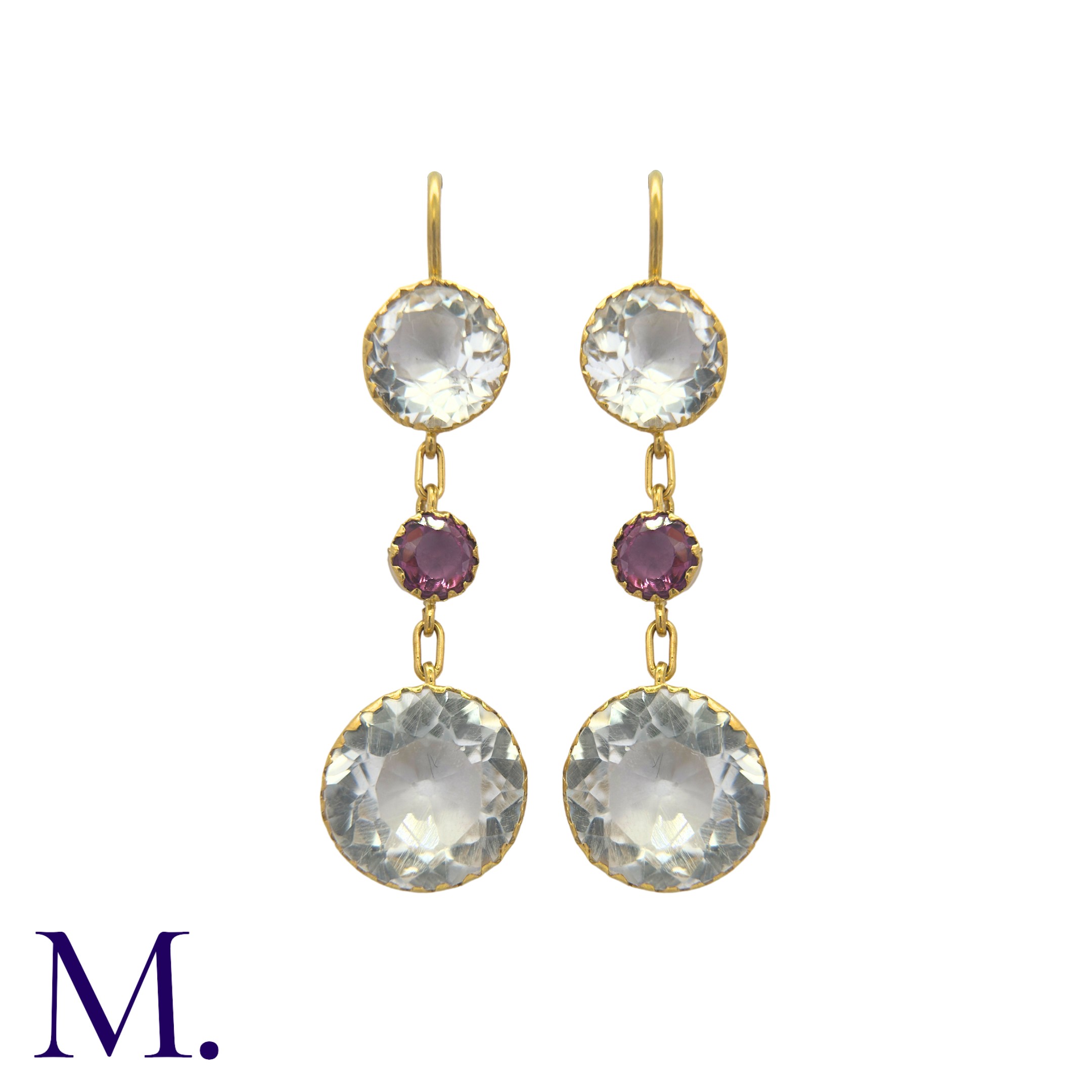 A Pair of Amethyst and Rock Crystal Earrings in yellow gold. Each set with round cut rock crystals