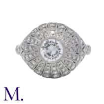 A Diamond Bombe Ring in white gold set in the centre with a round cut diamond of approximately 0.
