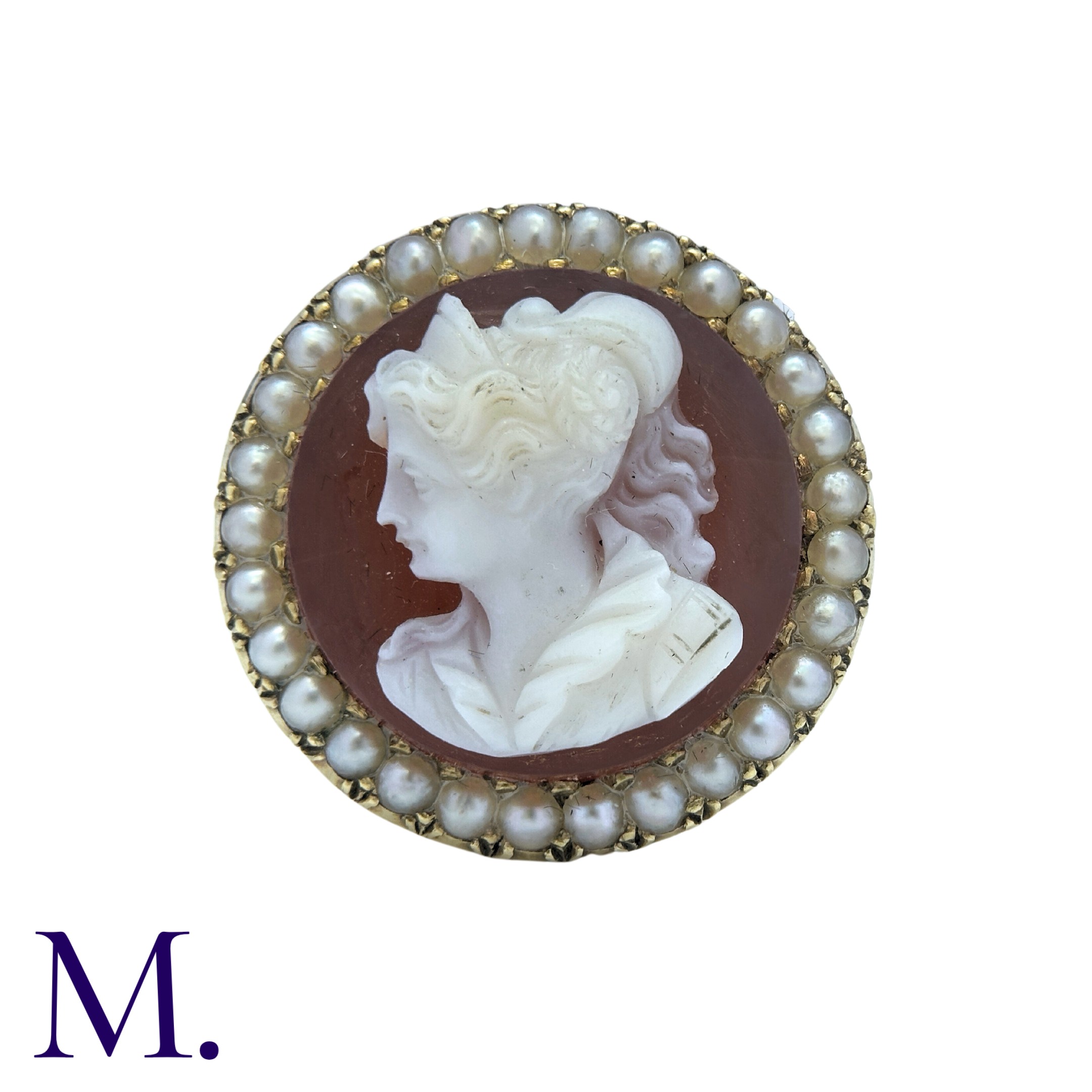 A Hardstone Cameo Ring in 18K yellow gold set with a hardstone cameo depicting a female bust, with