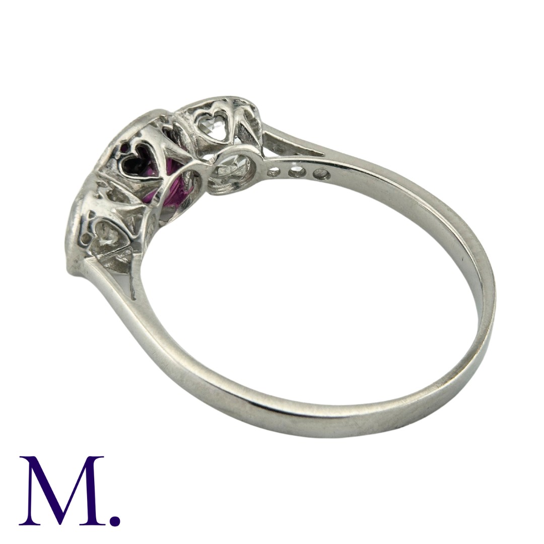 A Ruby And Diamond Three Stone Ring in platinum, set with a principal cushion cut ruby of - Image 4 of 4